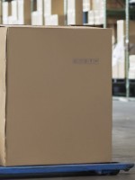 A-forklift-carrying-a-large-box.jpg
