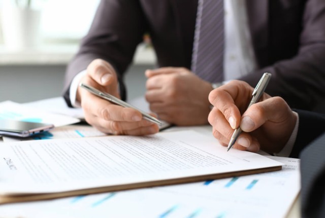 Businessman looking at finances